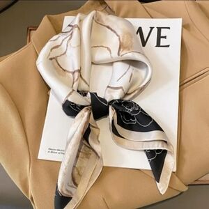 Elegant Beige and Black Scarf